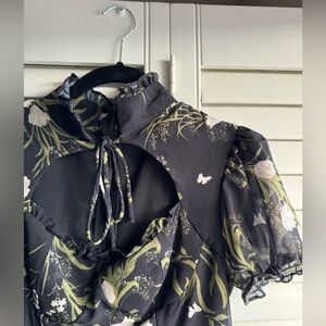 THE CUTEST reformation floral black mini dresss with chest cutout and bow